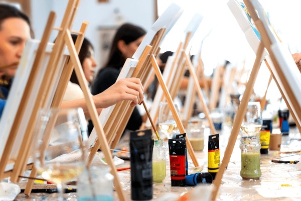 women-painting-easels-brushes-wine-600nw-2719353619